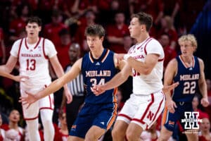 Midland Viking guard/forward Anthony Simon (34) guards Nebraska Cornhusker Cale Jacobsen (31) in the first half during a college men’s basketball exhibition game on Monday, October 27, 2025, in Lincoln, Nebraska. Photo by John S. Peterson.