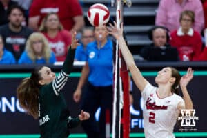 Nebraska Cornhusker setter Bergen Reilly (2) battles at the net against Michigan State Spartan outside hitter Bianca Mumcular (3) during a college volleyball match on Saturday, October 25, 2025, in Lincoln, Nebraska. Photo by John S. Peterson.
