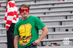 Nebraska Cornhusker fans dresses at Teenage Mutant Ninja Turtle, Raphael during a college football game on Saturday, October 25, 2025, in Lincoln, Nebraska. Photo by John S. Peterson.