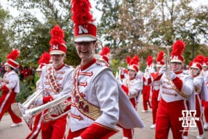 Nebraska Cornhusker Marching Band makes their way to the stadium before a college football game against the Northwestern Wildcats on Saturday, October 25, 2025, in Lincoln, Nebraska. Photo by John S. Peterson.