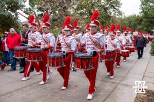 Nebraska Cornhusker Marching Band makes their way to the stadium before a college football game against the Northwestern Wildcats on Saturday, October 25, 2025, in Lincoln, Nebraska. Photo by John S. Peterson.