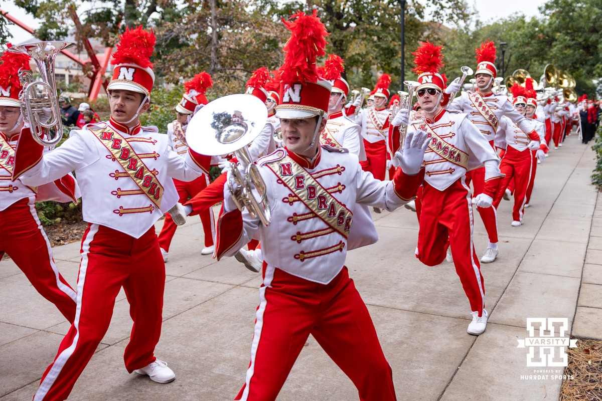 Nebraska Cornhusker Marching Band makes their way to the stadium before a college football game against the Northwestern Wildcats on Saturday, October 25, 2025, in Lincoln, Nebraska. Photo by John S. Peterson.