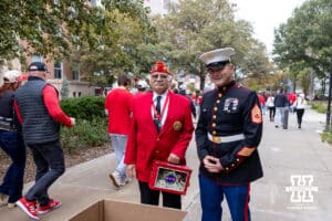 US Marines collecting for Toys for Tots at Nebraska's annual Military and Veterans Salute during a college football game against the Northwestern Wildcats on Saturday, October 25, 2025, in Lincoln, Nebraska. Photo by John S. Peterson.