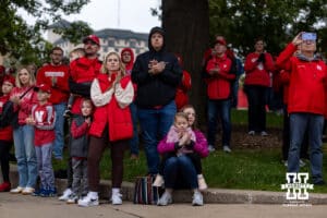 Nebraska Cornhusker fans watching the marching band warm-up before the college football game against the Northwestern Wildcats on Saturday, October 25, 2025, in Lincoln, Nebraska. Photo by John S. Peterson.