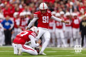 Nebraska Cornhusker kicker Kyle Cunanan (91) makes an extra point against the Northwestern Wildcats in the third quarter during a college football game on Saturday, October 25, 2025, in Lincoln, Nebraska. Photo by John S. Peterson.
