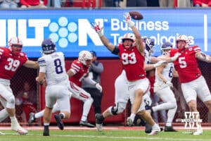Nebraska Cornhusker defensive lineman Kade Pietrzak (93) tips the football from a pass byNorthwestern Wildcat quarterback Preston Stone (8) in the second quarter during a college football game on Saturday, October 25, 2025, in Lincoln, Nebraska. Photo by John S. Peterson.