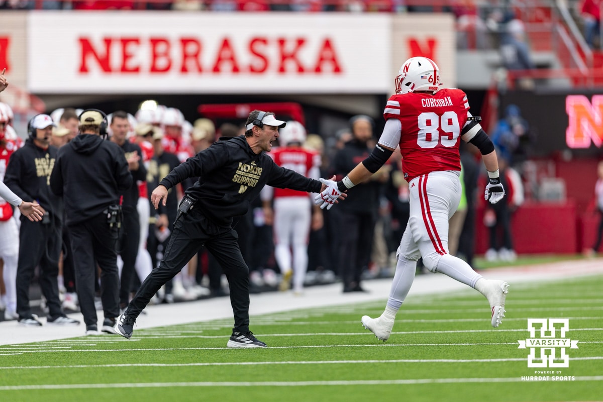 Nebraska Football v Northwestern | October 25, 2025 Nebraska Cornhuskers special team coordinator Mike Ekeler gives five to Nebraska Cornhusker offensive lineman Turner Corcoran (89) during a college football game on Saturday, October 25, 2025, in Lincoln, Nebraska. Photo by John S. Peterson.