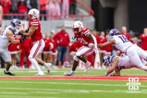 Nebraska Cornhusker running back Emmett Johnson (21) runs with the ball against the Northwestern Wildcats in the first quarter during a college football game on Saturday, October 25, 2025, in Lincoln, Nebraska. Photo by John S. Peterson.