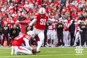 Nebraska Cornhusker kicker Kyle Cunanan (91) makes the extra point in the first quarter against the Northwestern Wildcats during a college football game on Saturday, October 25, 2025, in Lincoln, Nebraska. Photo by John S. Peterson.