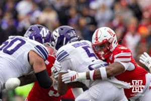 Nebraska Cornhusker defensive lineman Elijah Jeudy (16) tackles Northwestern Wildcat running back Caleb Komolafe (5) in the first quarter during a college football game on Saturday, October 25, 2025, in Lincoln, Nebraska. Photo by John S. Peterson.