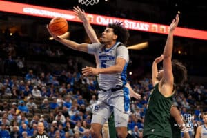 Creighton Bluejay Nik Graves (#5) gets past defenders during an exhibition against Colorado State on Saturday, October 25, 2025, in Omaha, Nebraska. Photo by Brandon Tiedemann.