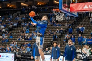 Creighton Bluejay Liam McChesney (#13) windmill dunks before an exhibition against Colorado State on Saturday, October 25, 2025, in Omaha, Nebraska. Photo by Brandon Tiedemann.