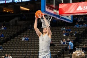 Creighton Bluejay Hudson Greer (#10) dunks in warmups before an exhibition against Colorado State on Saturday, October 25, 2025, in Omaha, Nebraska. Photo by Brandon Tiedemann.