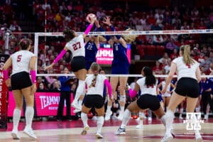 Nebraska Cornhusker outside hitter Harper Murray (27) spikes the ball against the Northwestern Wildcats in the third set during a college volleyball match on Friday, October 24, 2025, in Lincoln, Nebraska. Photo by John S. Peterson.