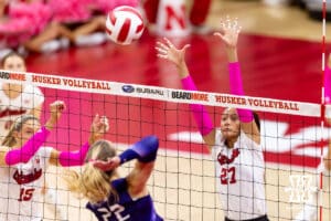 Nebraska Cornhusker outside hitter Harper Murray (27) readies to try and block Northwestern Wildcat outside hitter Isabella Bullington (22) in the first set during a college volleyball match on Friday, October 24, 2025, in Lincoln, Nebraska. Photo by John S. Peterson.