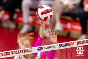 Nebraska Cornhusker middle blocker Rebekah Allick (5) reaches for the ball against the Northwestern Wildcats in the first set during a college volleyball match on Friday, October 24, 2025, in Lincoln, Nebraska. Photo by John S. Peterson.