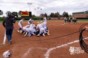 Hastings Saint Cecilia clebratea after a chapionship win during a high school softball game, Monday, October 20, 2025, Lincoln, Nebraska. Photo by Braden Cochran.