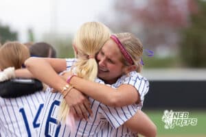 A Central City player celebrates with a teammate during a high school softball game, Monday, October 20, 2025, Lincoln, Nebraska. Photo by Braden Cochran.