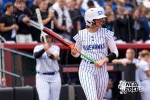 A Hastings Saint Cecilia player lines up for the bat during a high school softball game, Monday, October 20, 2025, Lincoln, Nebraska. Photo by Braden Cochran.