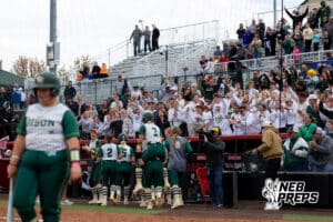 Central City softball team welcome back Juno Ryan (3) after a homerun during a high school softball game, Monday, October 20, 2025, Lincoln, Nebraska. Photo by Braden Cochran.