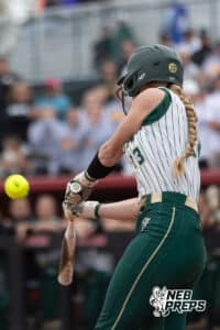 Central City Bison Jouni Schindler (13) takes a swing at the pitch during a high school softball game, Monday, October 20, 2025, Lincoln, Nebraska. Photo by Braden Cochran.