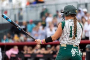 Central City pitcher Payton Burbach (11) LINES UP TO BAT during a high school softball game, Monday, October 20, 2025, Lincoln, Nebraska. Photo by Braden Cochran.