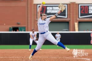 A Bluejay pitcher winds up for a pitch against Central City during a high school softball game, Monday, October 20, 2025, Lincoln, Nebraska. Photo by Braden Cochran.