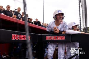 A Hasings St. Cecilia player cheers on her team during a high school softball game, Monday, October 20, 2025, Lincoln, Nebraska. Photo by Braden Cochran.