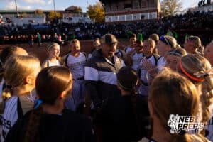Northwest head coach Mitch Sadd talks with his team after a high school softball championship game, Monday, October 20, 2025, Lincoln, Nebraska. Photo by Braden Cochran.