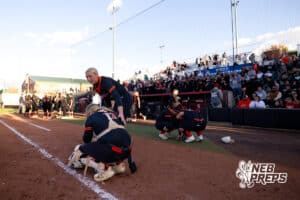 Beatrice teammates comfort each other after a loos in the state championships After a high school softball championship game, Monday, October 20, 2025, Lincoln, Nebraska. Photo by Braden Cochran.