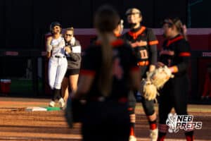 Northwest batter Jolie O'Hara celebrates after making it to first base in the bottom of the 7th inning during a high school softball championship game, Monday, October 20, 2025, Lincoln, Nebraska. Photo by Braden Cochran.