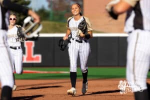 A Northwest infielder jogs back to the dugout after a strikeout during a high school softball championship game, Monday, October 20, 2025, Lincoln, Nebraska. Photo by Braden Cochran.