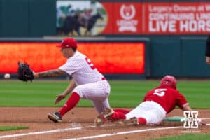 First baseman Gavin Blachowicz (5) is passed the ball in attempt to tag the runner out during the red/white scrimmage on Tuesday, October 14th, 2025, Lincoln, Nebraska. Photo by Braden Cochran.