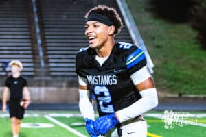 Millard North's Josiah Wardlow (2) is celebrating after getting a huge win against Omaha Central after a high school football game on Friday, October 17, 2025, in Omaha, Nebraska. Photo By Jack Stephens.