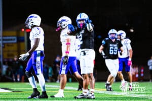 Millard North's Josiah Wardlow (2) signaling for a first down after gaining a first down during a high school football game against Omaha Central on Friday, October 17, 2025, in Omaha, Nebraska. Photo By Jack Stephens.