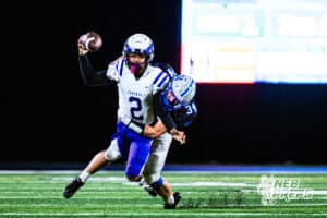 Millard North's Austin Ruhter (34) sacking Omaha Central's Yasir Grixby (2) for a loss of yards during a high school football game against Omaha Central on Friday, October 17, 2025, in Omaha, Nebraska. Photo By Jack Stephens.
