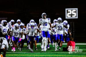 Omaha Central running out as a team before a high school football game at Millard North on Friday, October 17, 2025, in Omaha, Nebraska. Photo By Jack Stephens.
