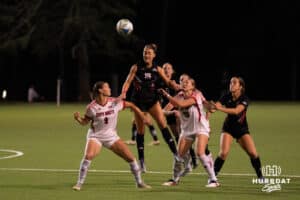 Omaha Maverick Payten Ivins (19) jumps for the ball during a match against South Dakota on Thursday, October 23, 2025, in Omaha, Nebraska. Photo by Brandon Tiedemann.