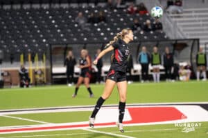 Omaha Maverick Emma Hampton (22) heads the ball during a match against South Dakota on Thursday, October 23, 2025, in Omaha, Nebraska. Photo by Brandon Tiedemann.
