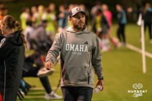 Omaha Maverick head coach Tim Walters walks the sideline during a match against South Dakota on Thursday, October 23, 2025, in Omaha, Nebraska. Photo by Brandon Tiedemann.