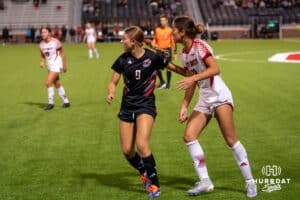 Omaha Maverick Isabelle Milne (9) defends an inbound during a match against South Dakota on Thursday, October 23, 2025, in Omaha, Nebraska. Photo by Brandon Tiedemann.