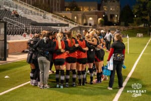 Omaha Mavericks huddle during a match against South Dakota on Thursday, October 23, 2025, in Omaha, Nebraska. Photo by Brandon Tiedemann.