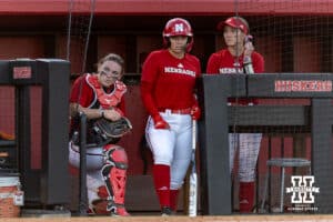 Nebraska Cornhuskers Carlie Muhlbach (72), Ava Kuszak (7), and Jordyn Bahl (98) hanging out in the dugout during Nebraska Red/White Game on Wednesday, October 22, 2025, in Lincoln, Nebraska. Photo by John S. Peterson.