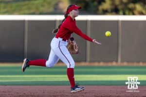 Nebraska Cornhusker Ava Kuszak (7) tosses the ball to second for the out during Nebraska Red/White Game on Wednesday, October 22, 2025, in Lincoln, Nebraska. Photo by John S. Peterson.