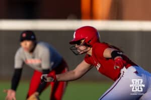 Nebraska Cornhusker Carlie Muhlbach (72) leads off first during Nebraska Red/White Game on Wednesday, October 22, 2025, in Lincoln, Nebraska. Photo by John S. Peterson.