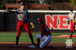Nebraska Cornhusker Scarlet team Alina Felix (26) slides at second against Cream team Skarlett Jones (0) during Nebraska Red/White Game on Wednesday, October 22, 2025, in Lincoln, Nebraska. Photo by John S. Peterson.