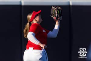 Nebraska Cornhusker Malia Thoms (4) makes a catch warming up during Nebraska Red/White Game on Wednesday, October 22, 2025, in Lincoln, Nebraska. Photo by John S. Peterson.