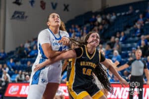 Creighton Bluejay Grace Boffeli (#42) looks to grab a rebound during an exhibition against Missouri Western on Wednesday, October 22, 2025, in Omaha, Nebraska. Photo by Brandon Tiedemann.