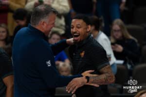 Creighton Bluejay head coach Greg McDermott embraces Iowa State grad assistant Jawaun Newton during a basketball game at CHI Health Arena on Friday, October 17, 2025, in Omaha, Nebraska. Photo by Collin Stilen.