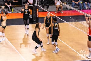 Team Thompson Molly McCage (#5) celebrates a point with team captain Jordan Thompson (#97) during the Athletes Unlimited Volleyball match against Team Valentin-Anderson on Monday, October 13, 2025, in Omaha, Nebraska. Photo by Dawson Anderson.